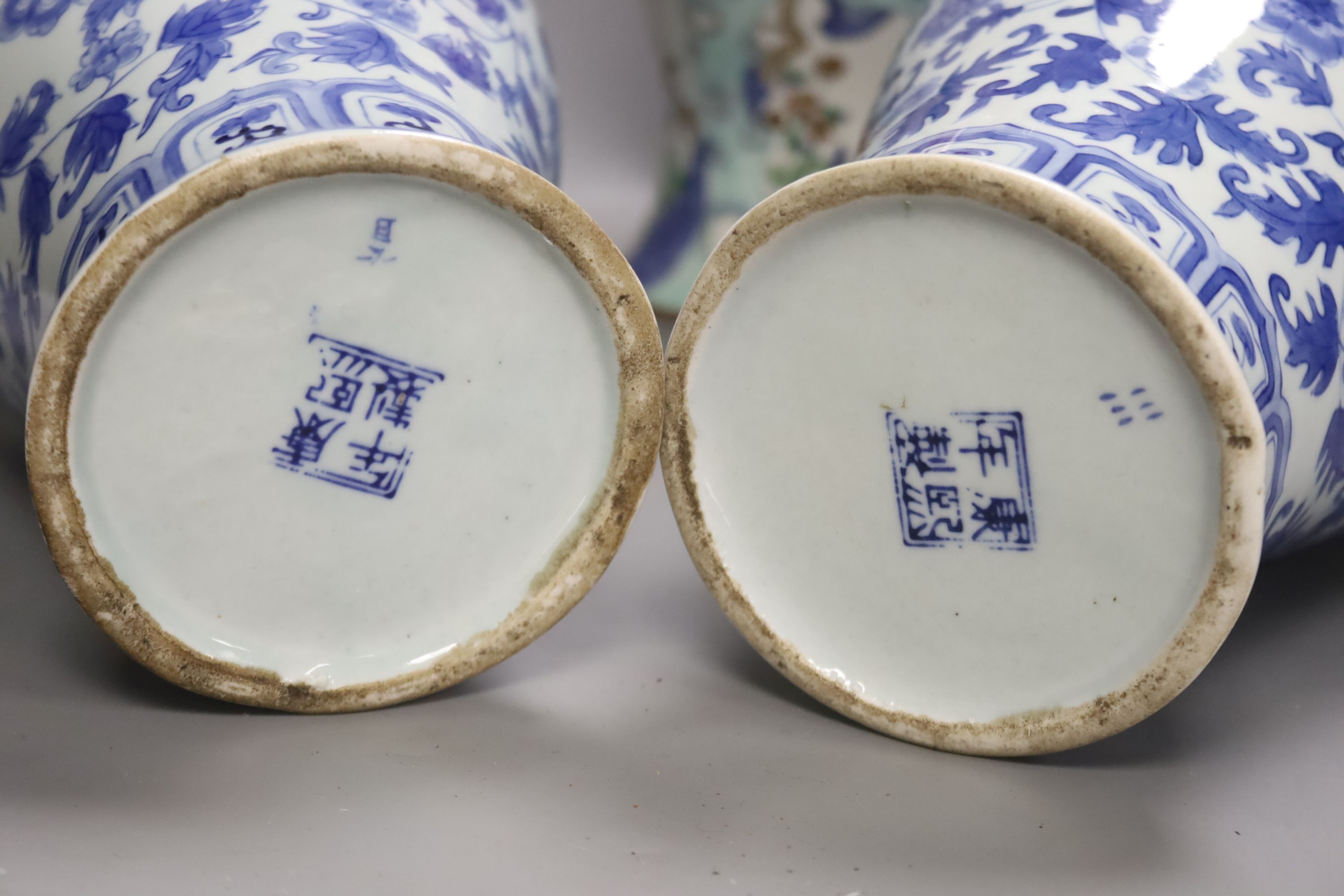 A pair of blue and white Chinese vases, height 31cm, and two others